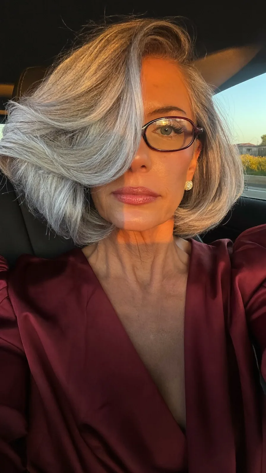 Voluminous Classic Chin-Length Bob with Elegant Side-Swept Bangs