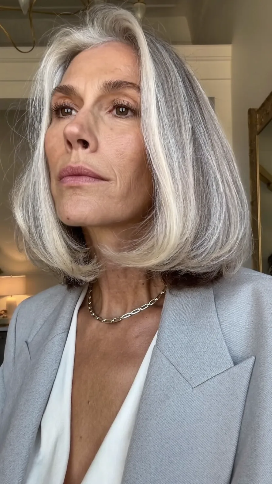 Elegant Chin-Length Silver Bob With Soft Flicked Ends