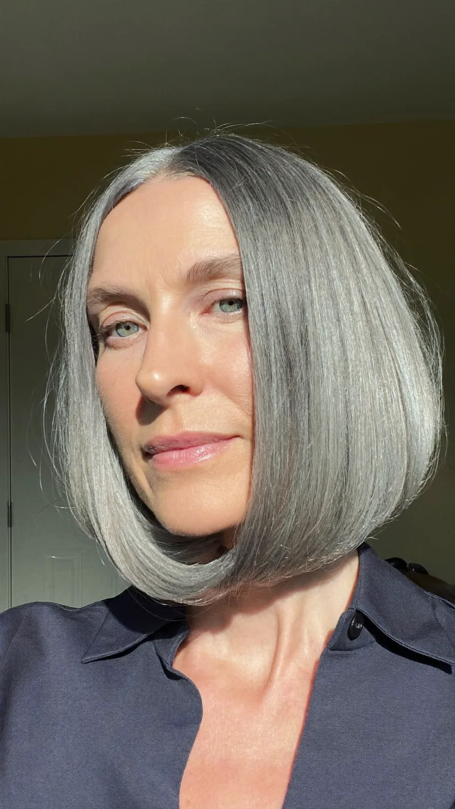 Sleek Center-Parted Chin-Length Bob with Rounded Ends