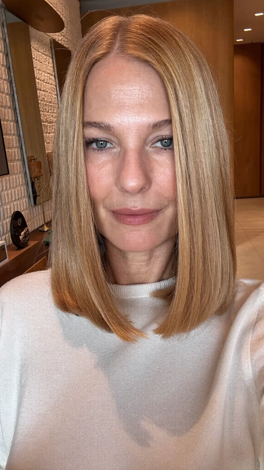 Sleek Shoulder-Length Blunt Bob with Warm Honey Blonde