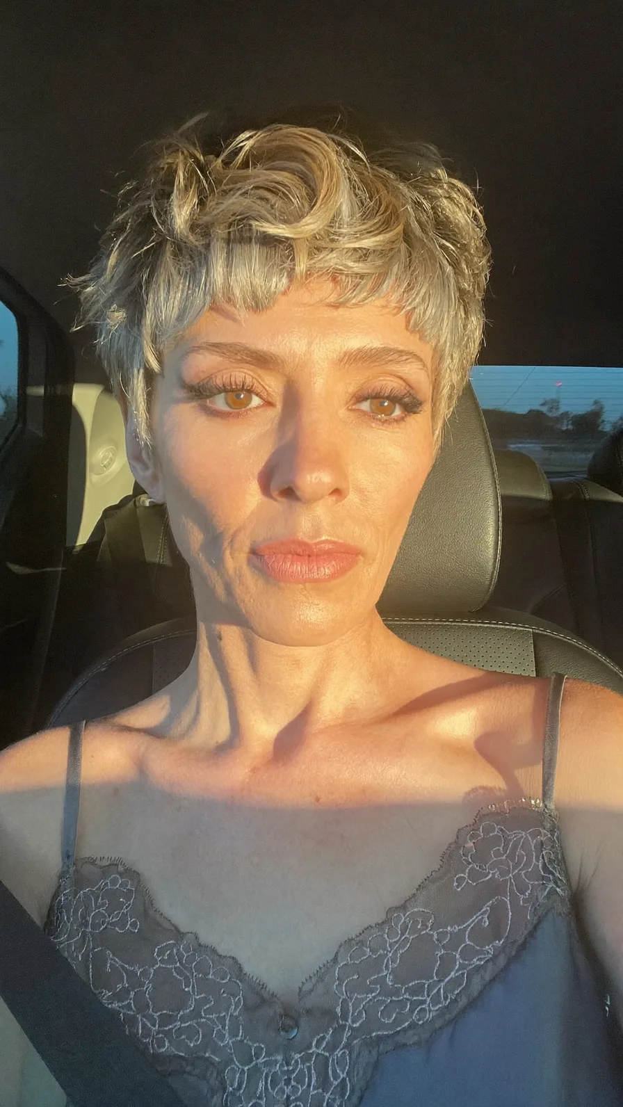 Textured Platinum Blonde Pixie with Blunt Short Bangs