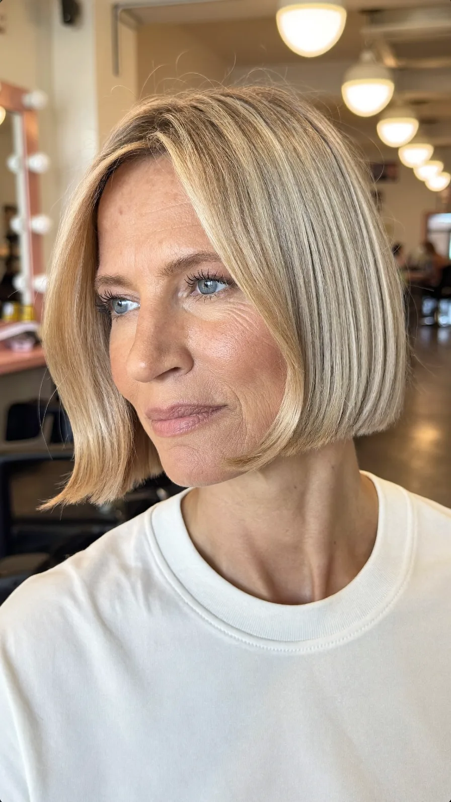 Chic Blunt Chin-Length Bob with Soft Curtain Bangs Style