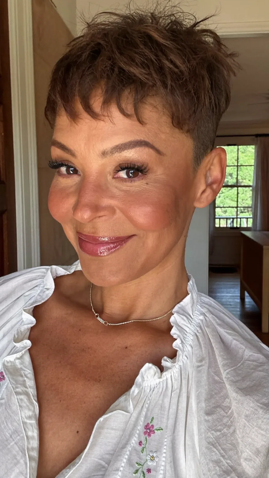 Textured Voluminous Pixie Cut with Wispy Bangs