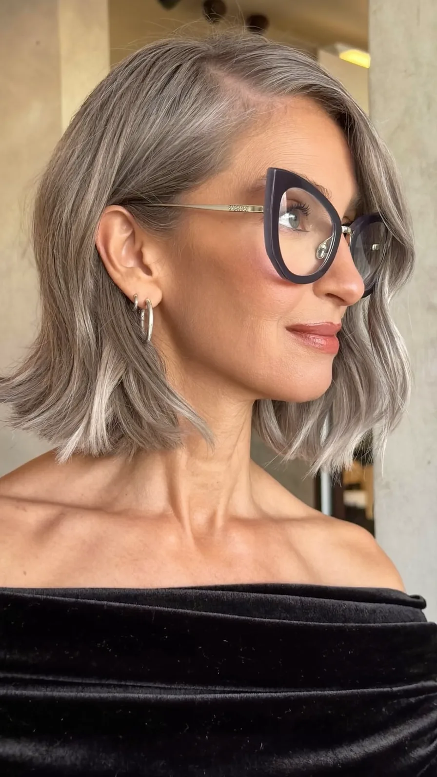 Elegant Shoulder-Length Silver Lob with Side-Swept Bangs