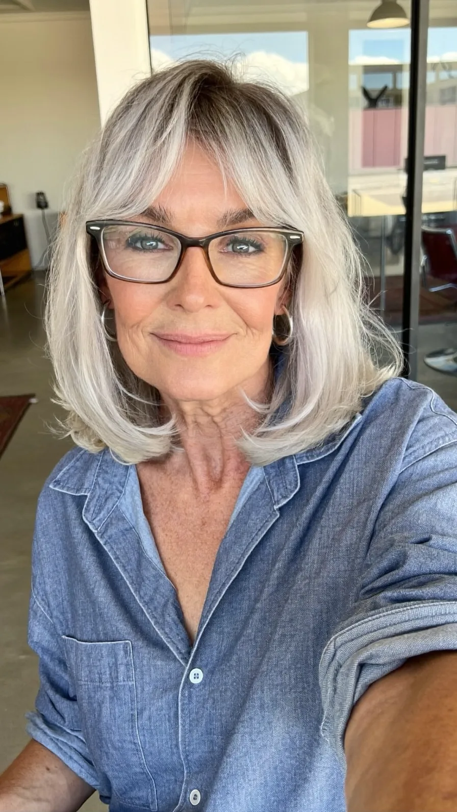 Soft Shoulder-Length Silver Blonde Lob with Flicked Ends