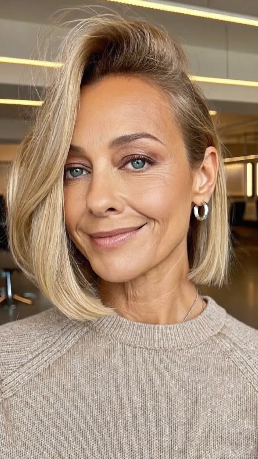 Chin-Length Warm Honey Blonde Bob with Side-Swept Bangs