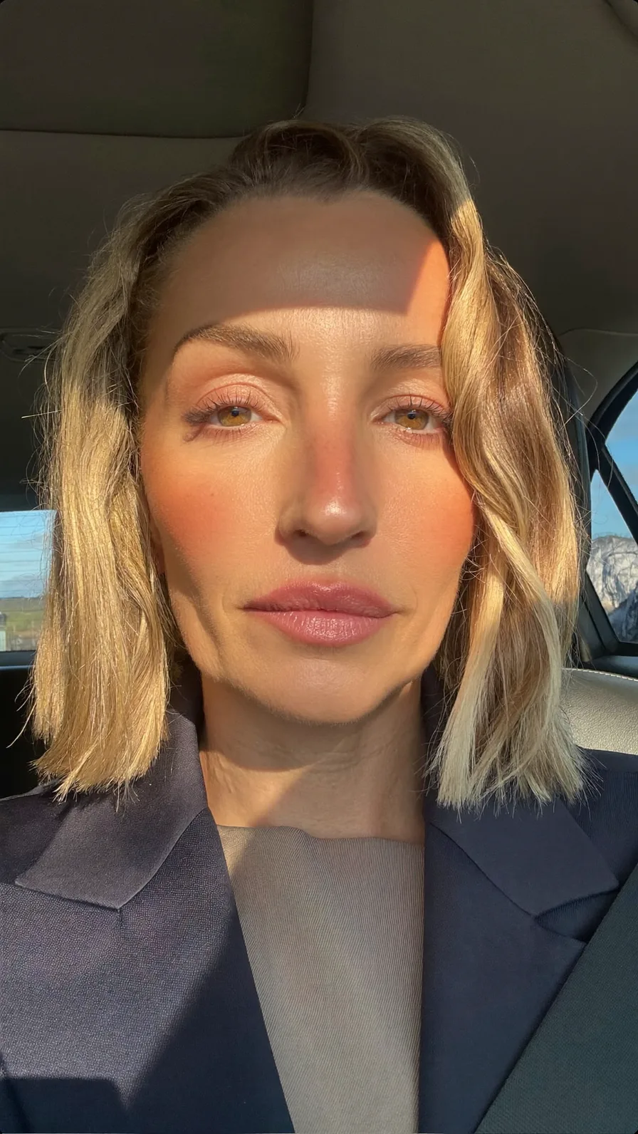 Chic Warm Honey Blonde Blunt Bob with Natural Waves