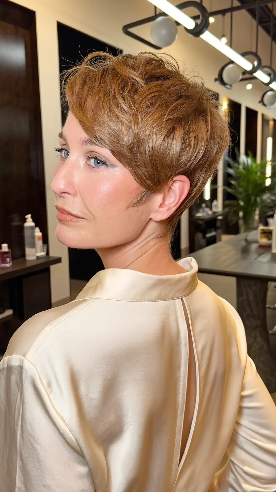 Modern Textured Pixie Cut with Warm Copper Brown Hue