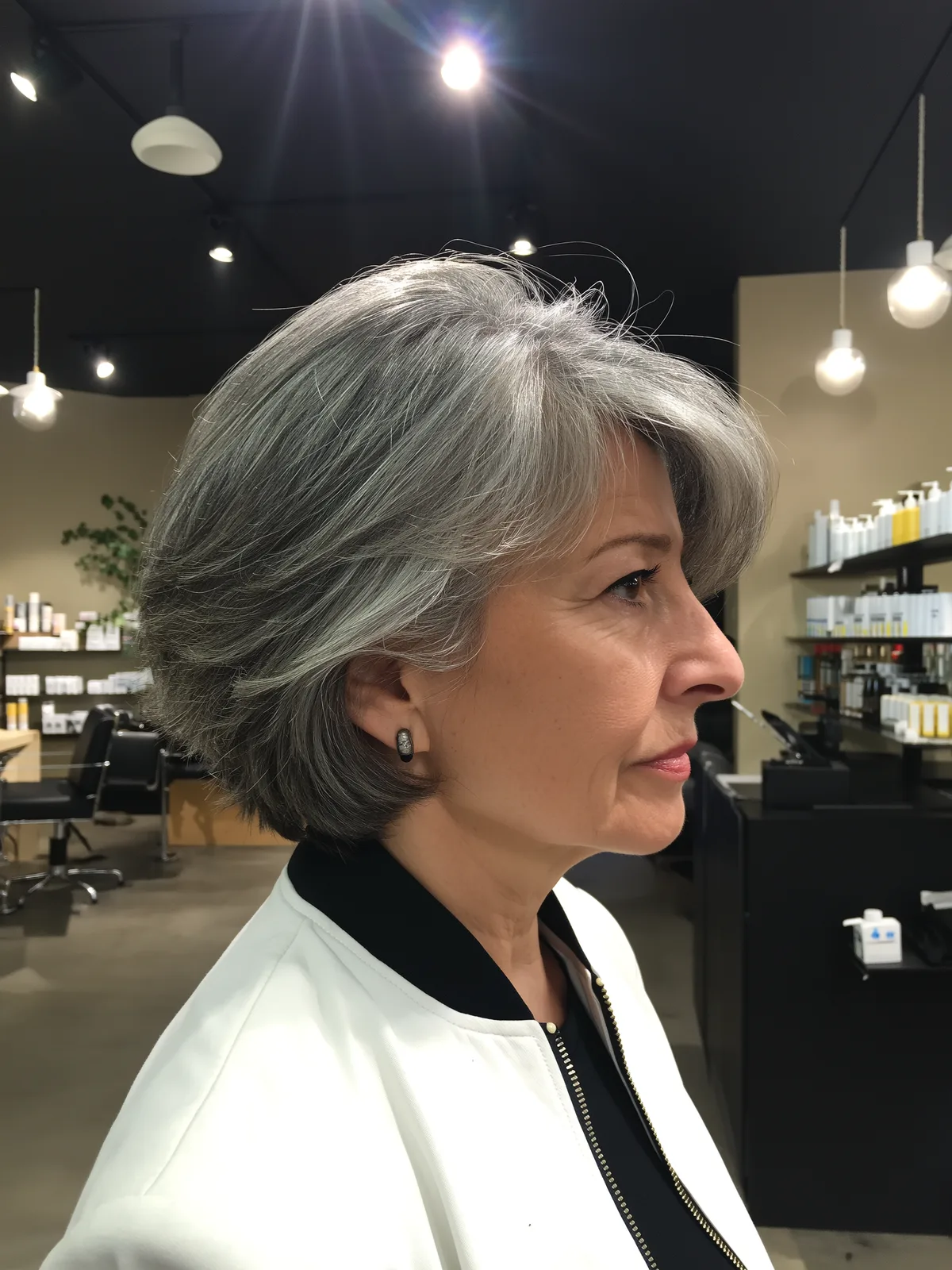 Medium Volume Silver Frost Wavy Bob with Side-Swept Bangs
