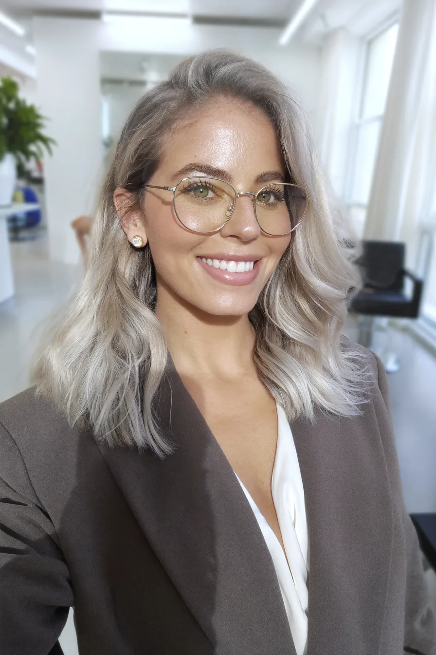 Modern Ash Blonde Shoulder-Length Wavy Long Layered Hairstyle