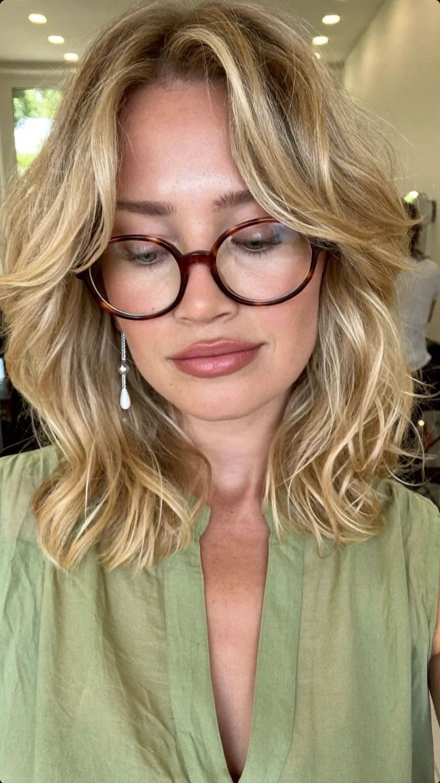Voluminous Layered Lob with Curtain Bangs and Feathered Ends