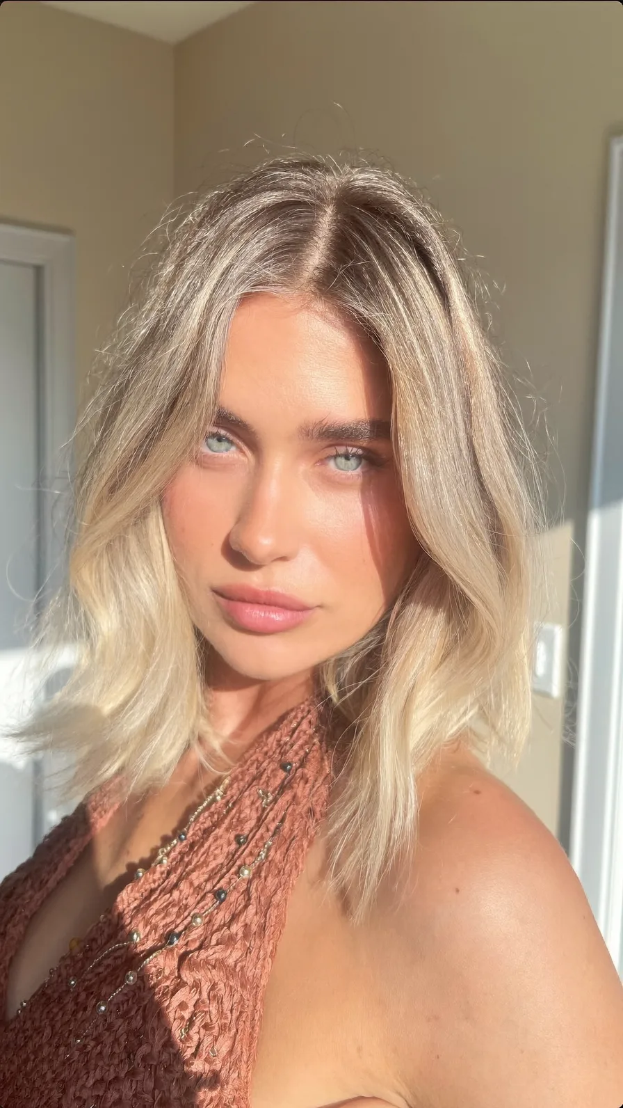Wavy Shoulder-Length Long Layers with Platinum Blonde Highlights