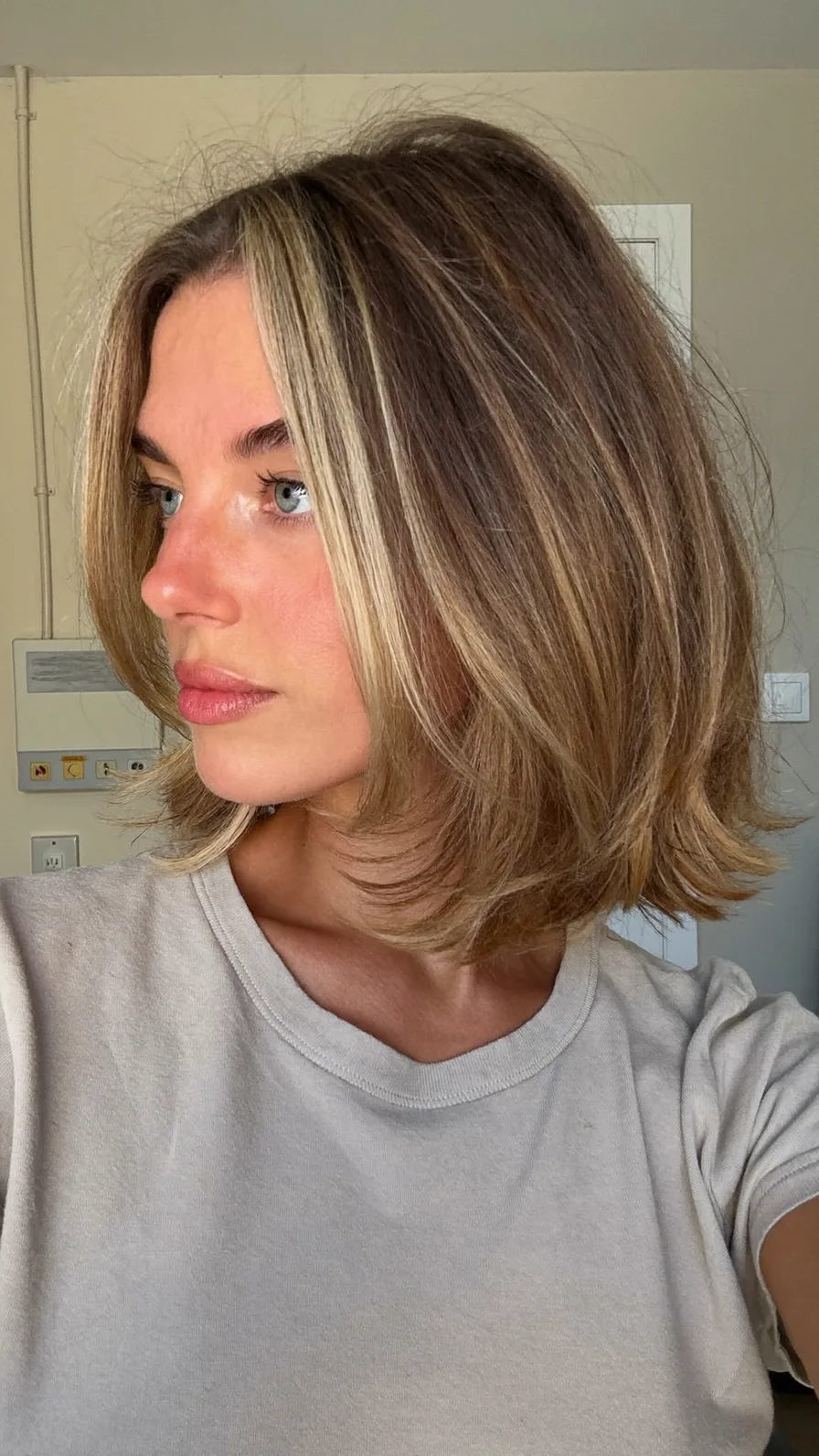 Modern Layered Lob with Balayage Flicked Ends and Long Bangs