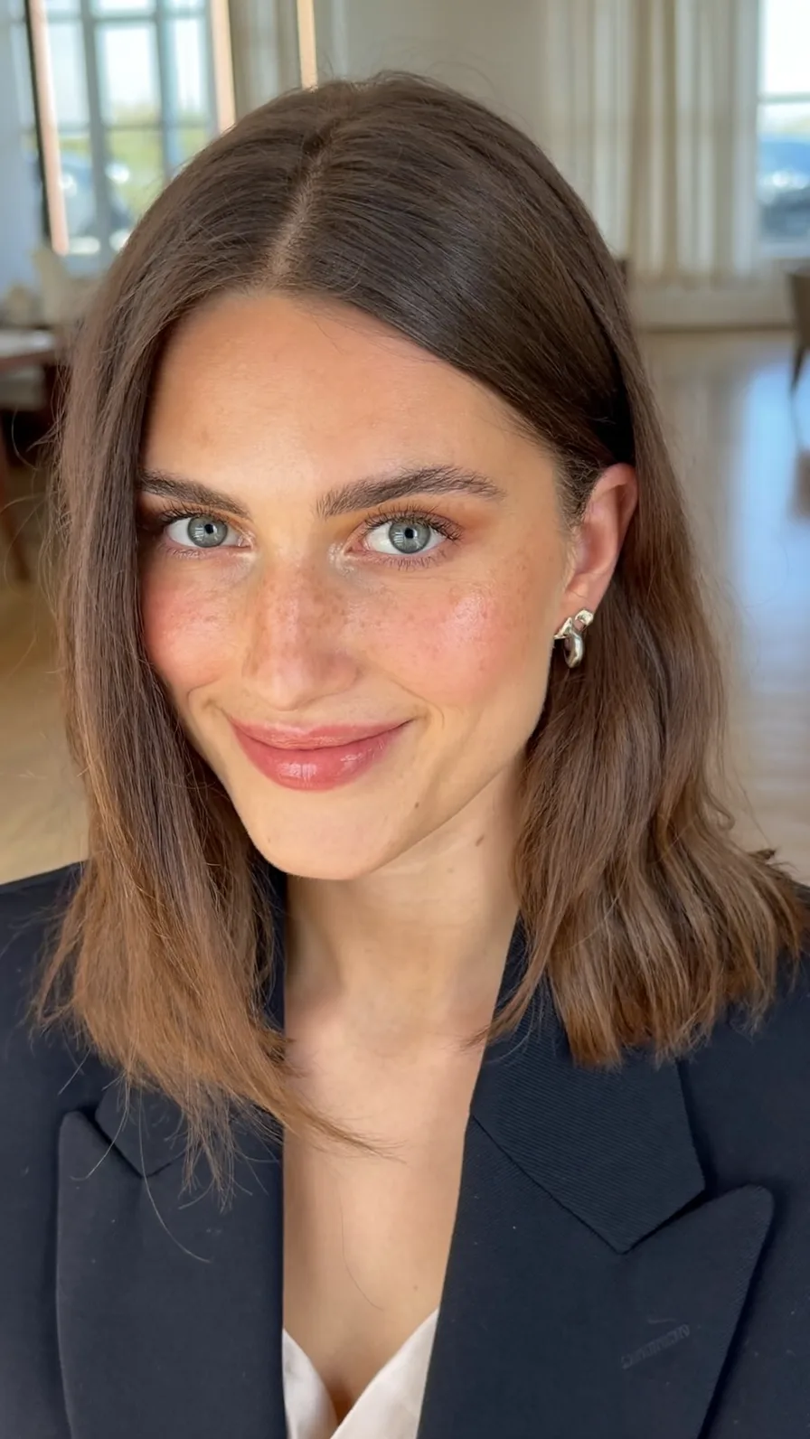 Medium Shoulder-Length Ash Brown Hair with Long Layers