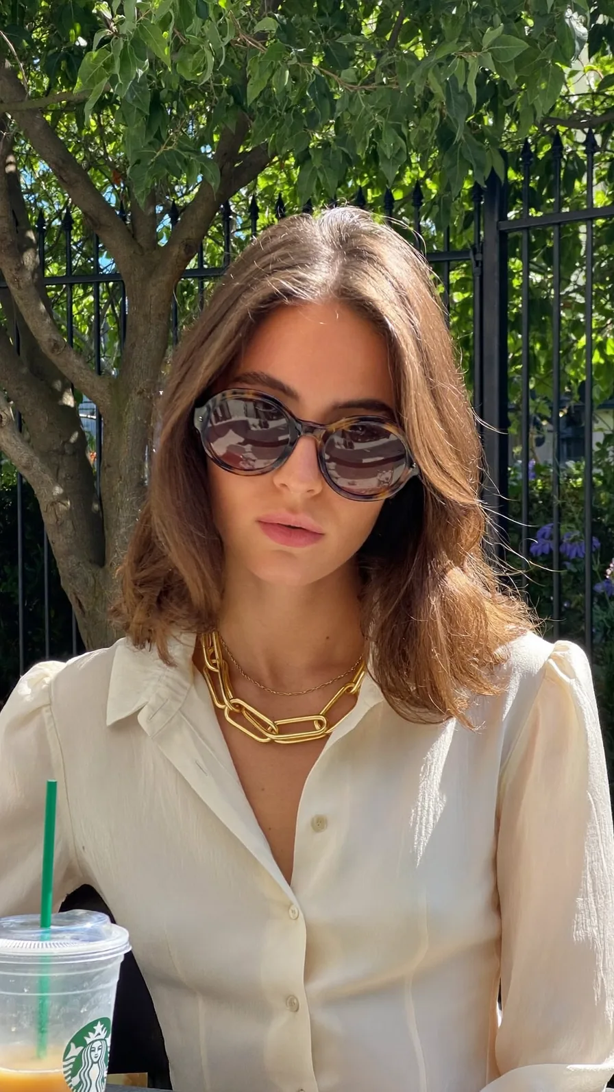 Effortless Shoulder-Length Layered Hair with Curtain Bangs