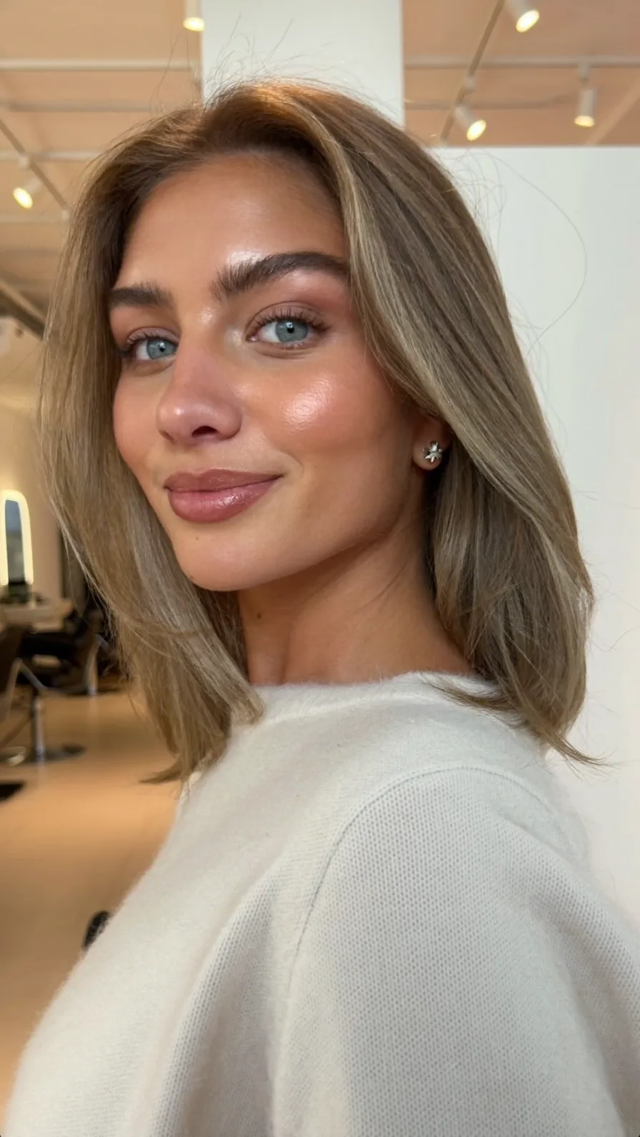 Subtle Multi-Dimensional Ash Brown Shoulder-Length Hairstyle