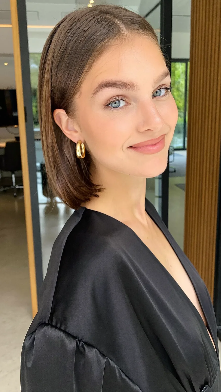 Sleek Shoulder-Length Blunt Bob with Center Parting