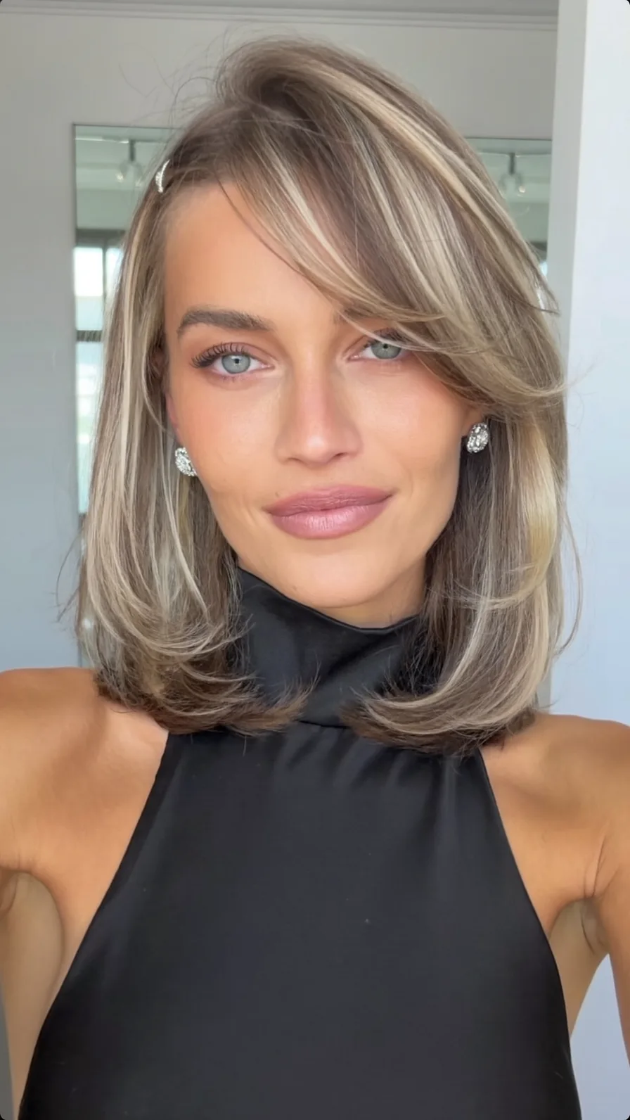 Modern Layered Shoulder-Length Bob with Feathered Ends