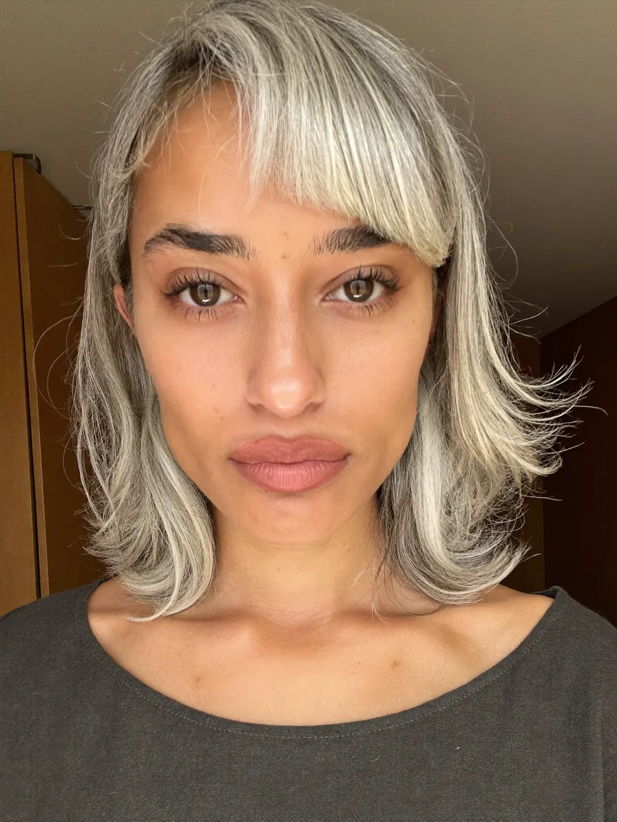 Modern Shoulder-Length Layered Bob with Flicked Ends