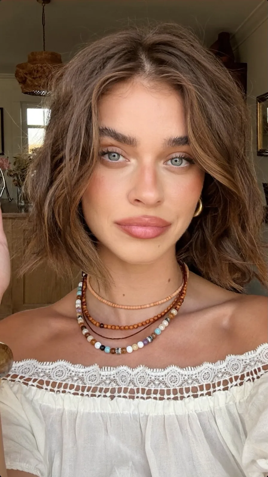 Textured Shoulder-Length Choppy Bob with Center Curtain Bangs