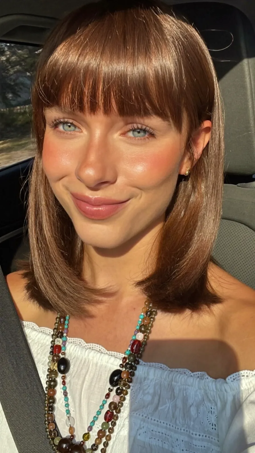 Sleek Shoulder-Length Blunt Bob with Classic Blunt Bangs