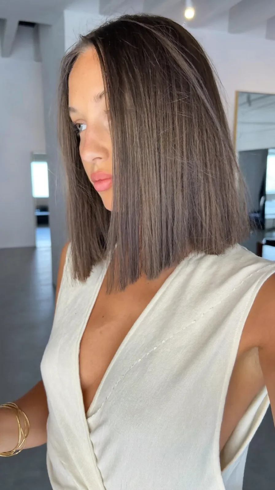 Sleek Shoulder-Length Blunt Bob with Center Parting