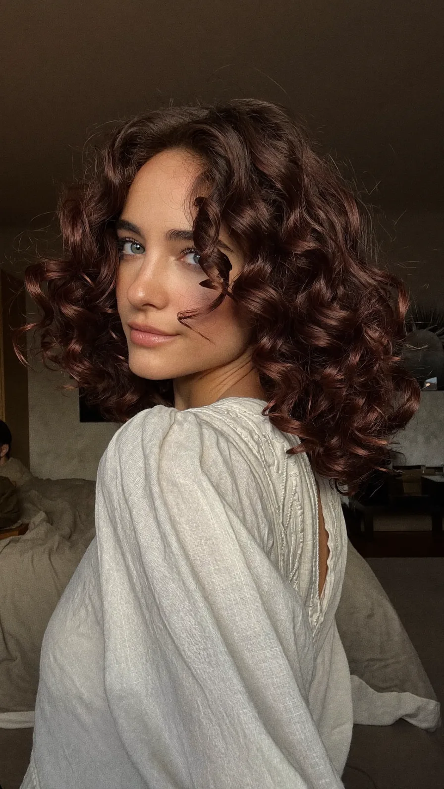 Voluminous Shoulder-Length Curly Bob with Rounded Ends