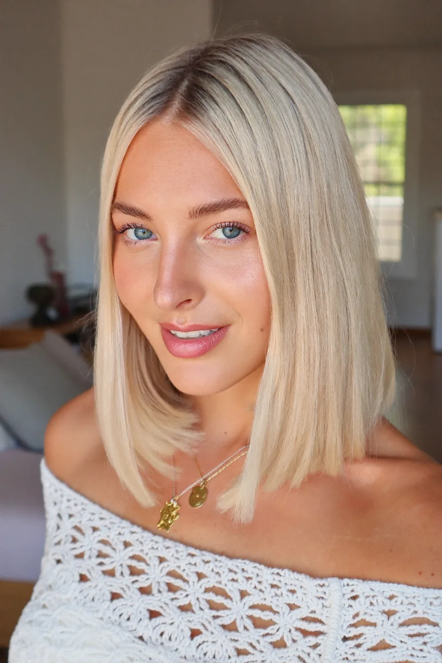 Sleek Platinum Blonde Blunt Bob with Center Part