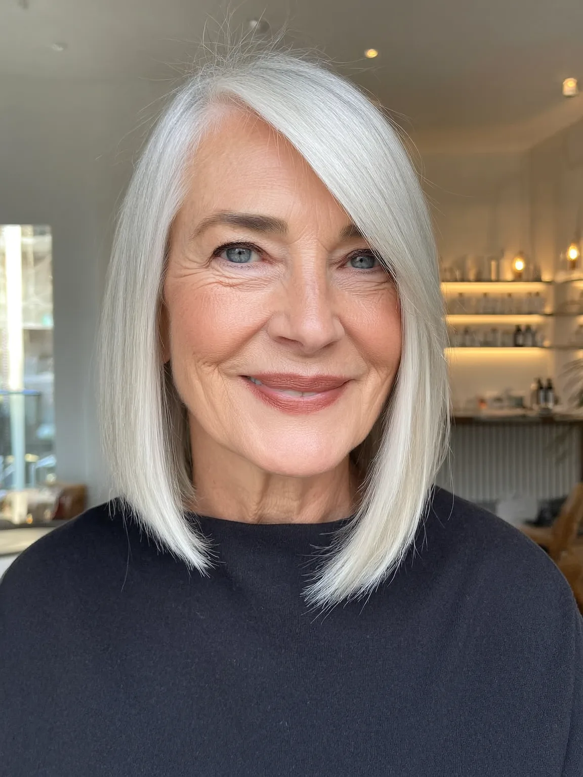 Silver Frost Bob with Side-Swept Bangs for Oval Faces