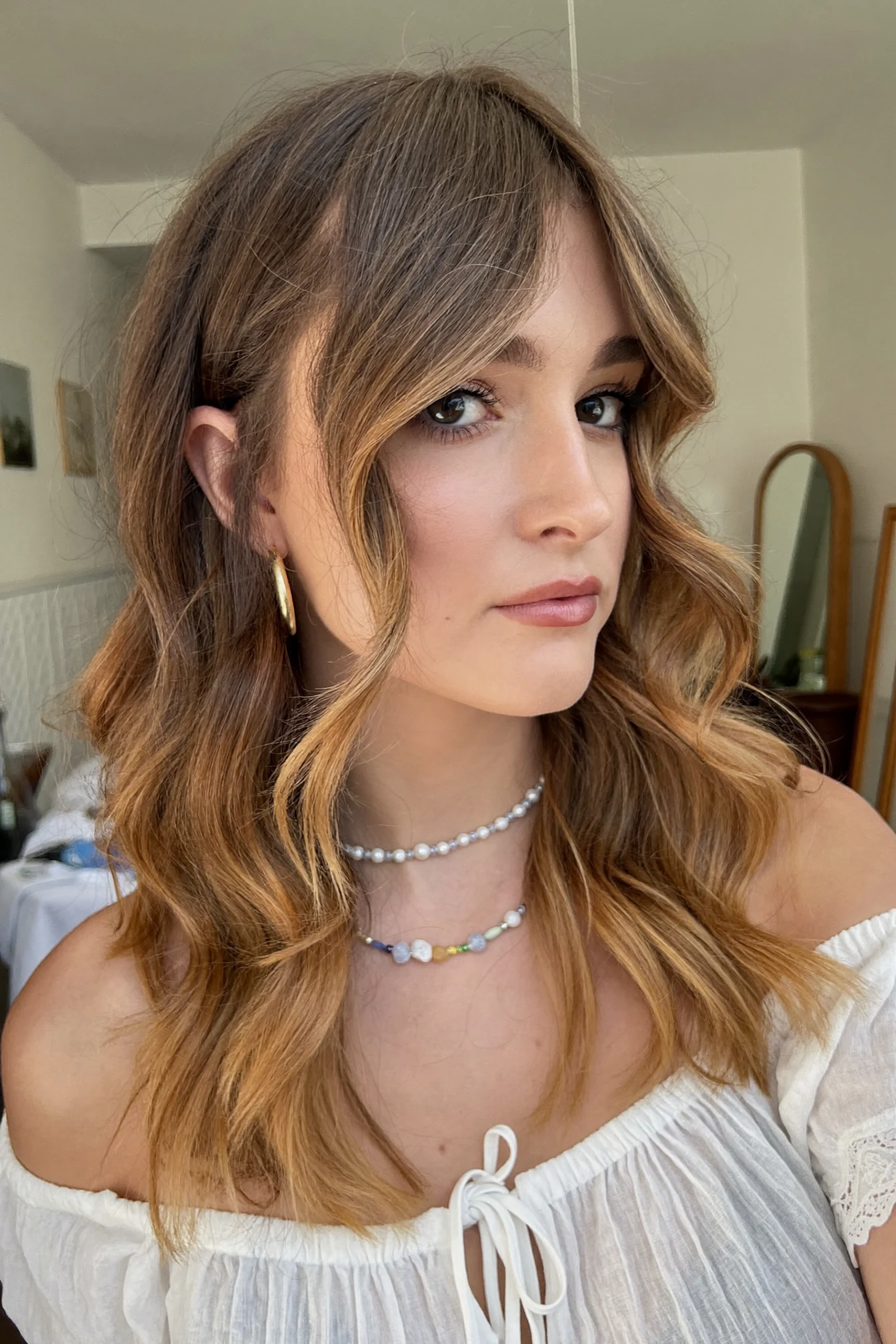 Balayage Lob with Face-Framing Layers and Loose Waves