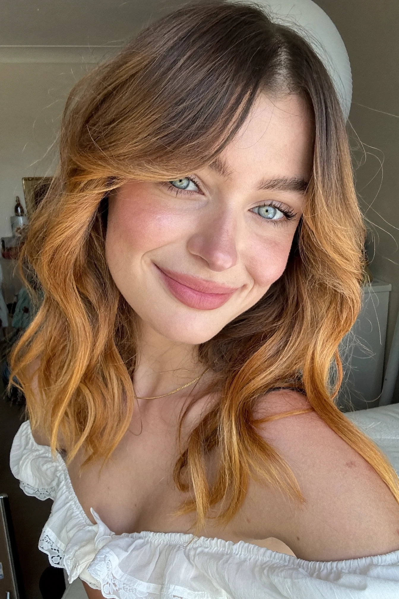Caramel Brown Shoulder Lob With Curtain Bangs: What To Ask Your Stylist For