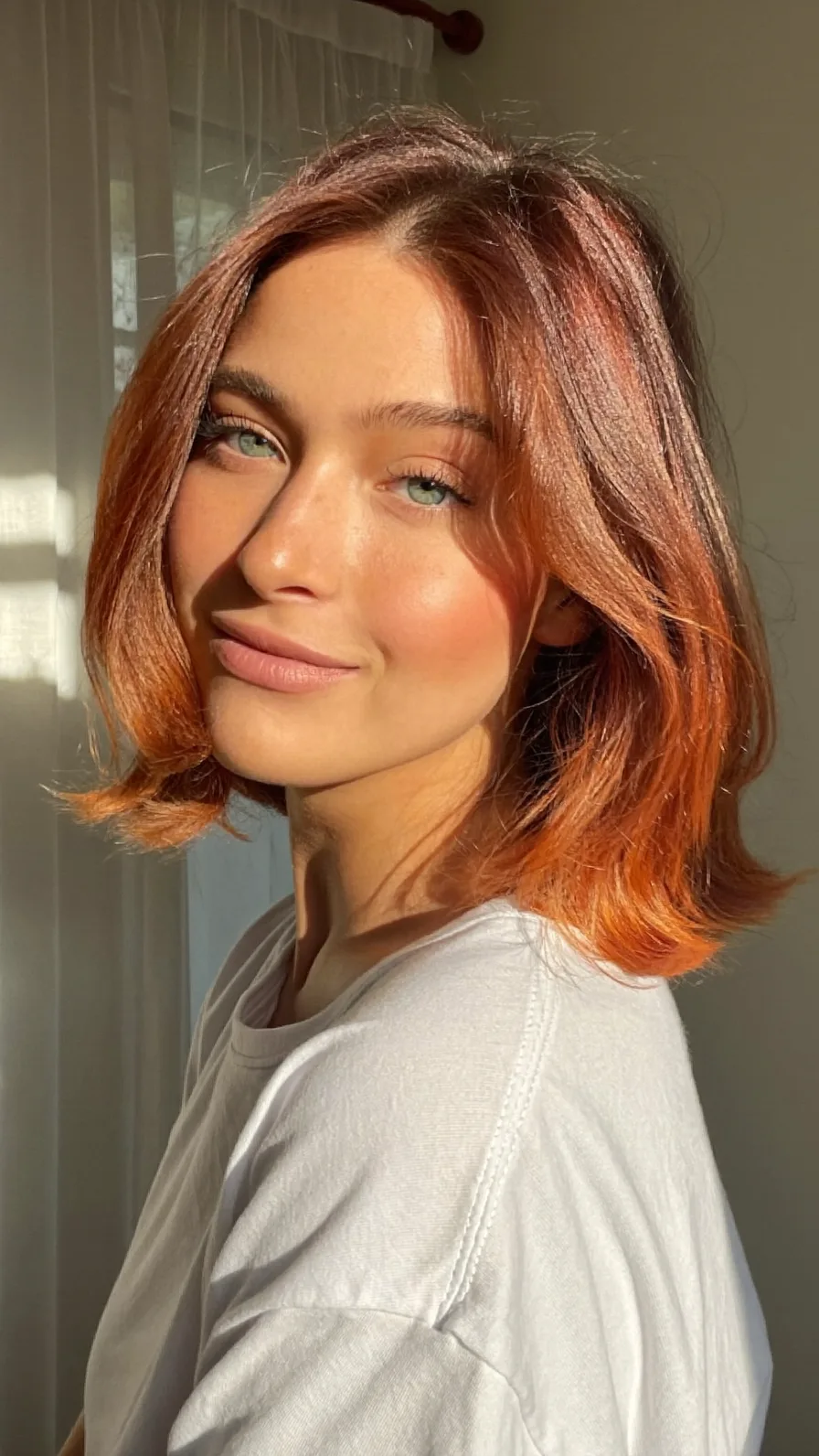 Soft Flowing Shoulder-Length Lob with Curtain Bangs