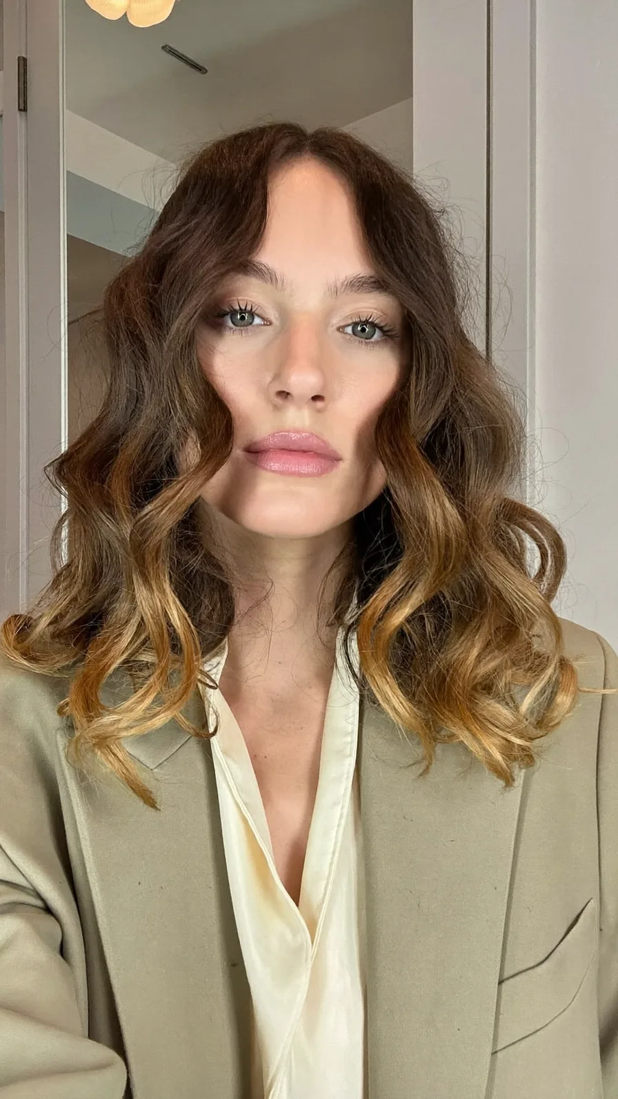 Modern Shoulder-Length Waves With Warm Caramel Balayage