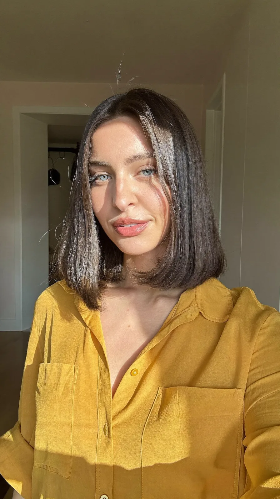 Sleek Shoulder-Length Lob with Soft Curtain Bangs