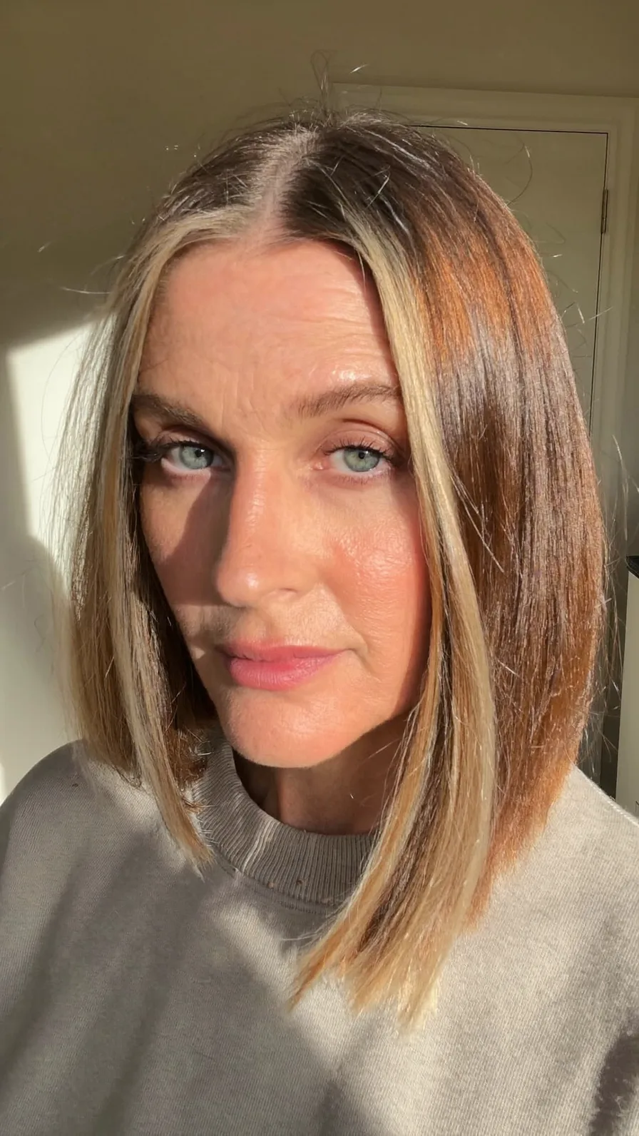 Sleek Blunt Bob with Ash Blonde Money Pieces and Center Part