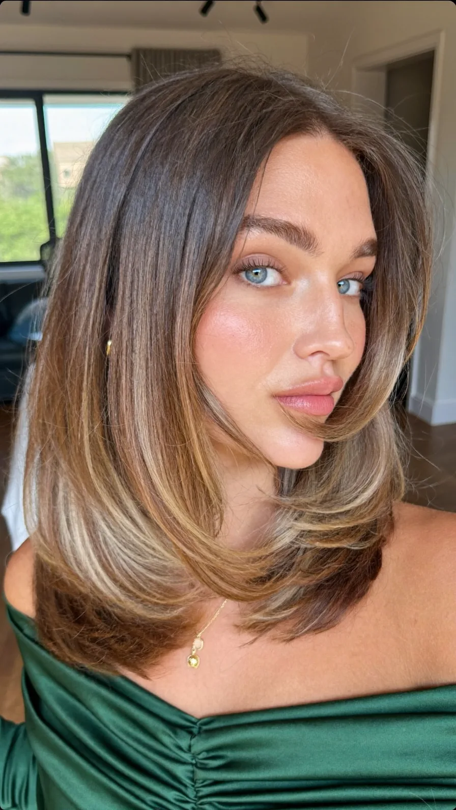 Modern Long Layered Hair with Caramel Balayage and Curtain Bangs