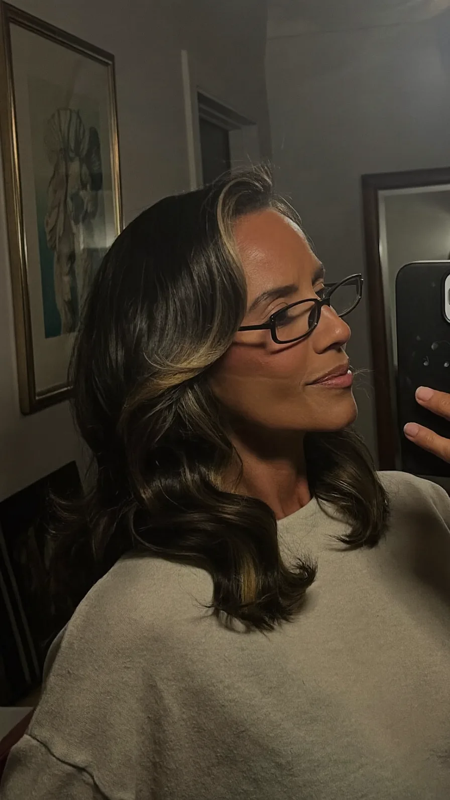 Soft Shoulder-Length Layers with Caramel Babylights and Side-Swept Bangs