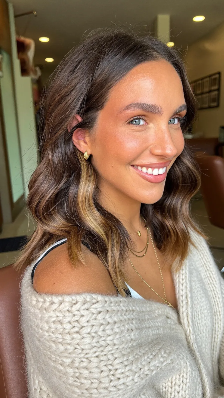 Shoulder-Length Wavy Balayage with Long Layered Cut