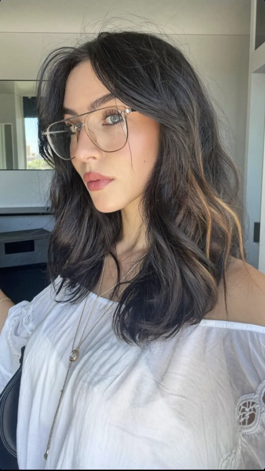 Modern Shoulder-Length Long Layered Hairstyle with Curtain Bangs