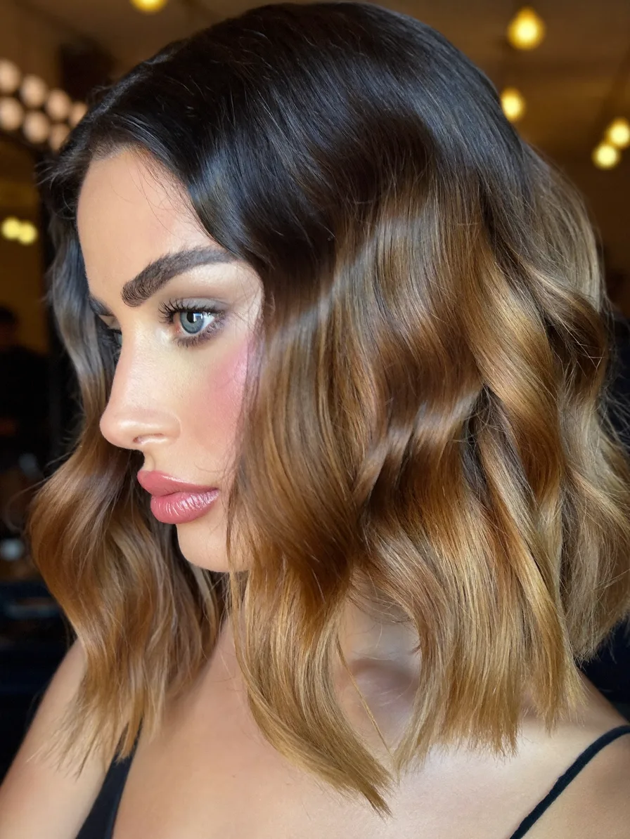 Modern Wavy Lob with Warm Caramel Balayage Highlights