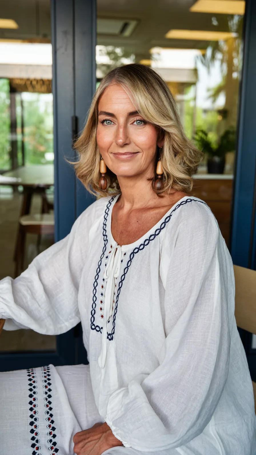 Soft Shoulder-Length Honey Blonde Layers with Side-Swept Bangs