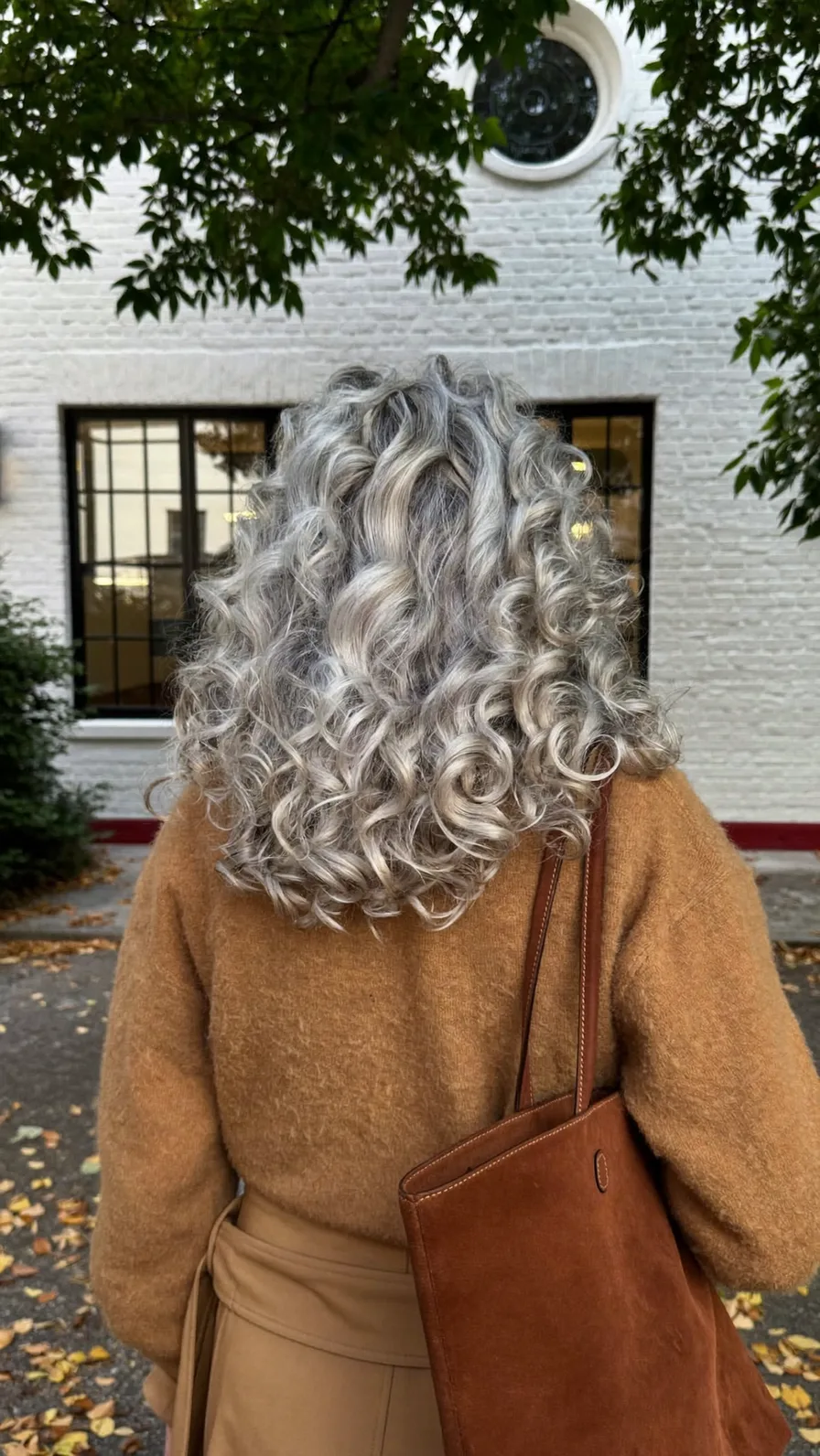 Voluminous Shoulder-Length Curly Silver Gray Long Layers