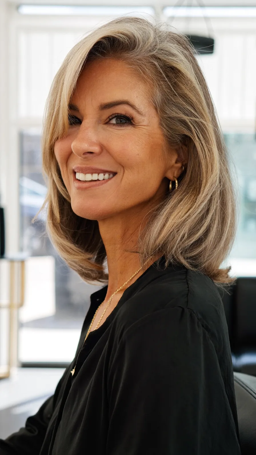 Sophisticated Shoulder-Length Ash Blonde Long Layered Hairstyle