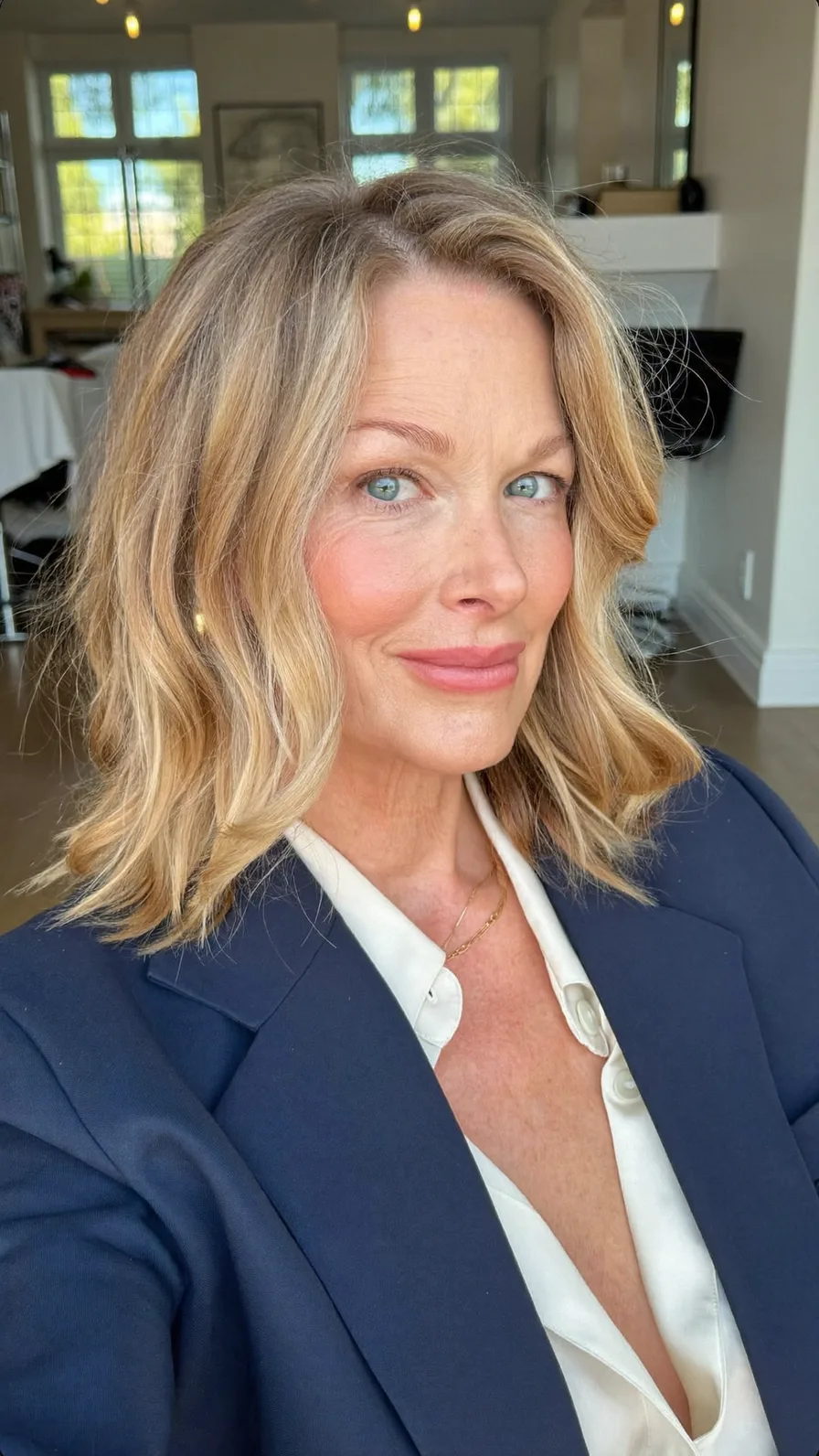 Soft Honey Blonde Shoulder-Length Waves with Side-Swept Bangs