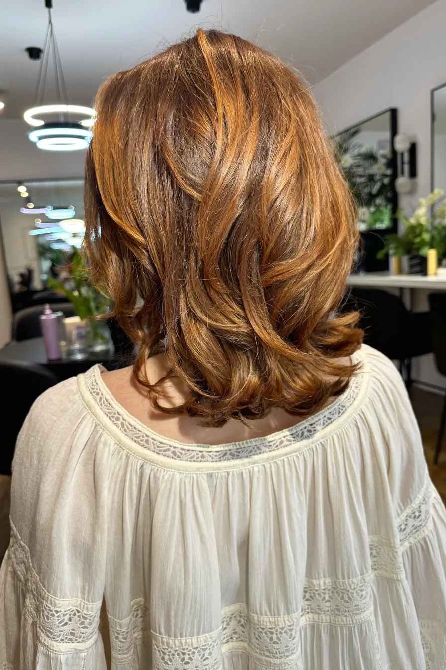 Warm Caramel Brown Shoulder-Length Layered Hairstyle