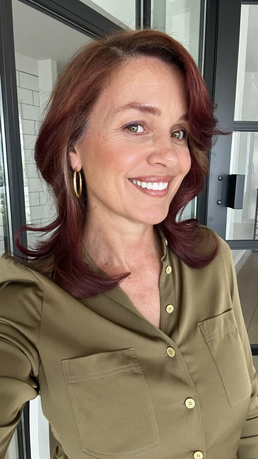 Classic Shoulder-Length Mahogany Layered Hairstyle with Side Sweep