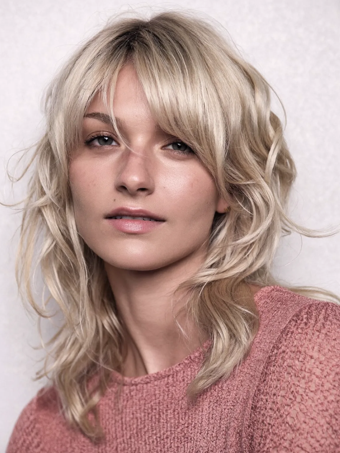 Textured Shag with Curtain Bangs in Sandy Blonde