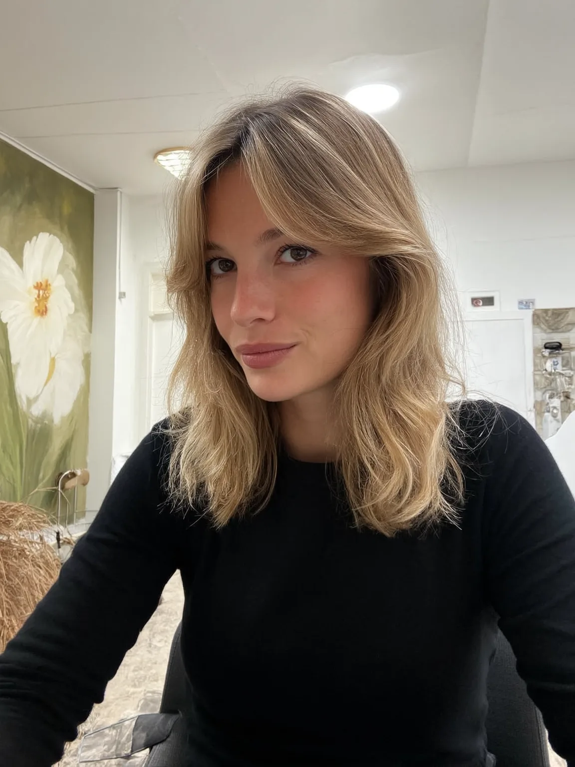 Shoulder-Length Layers with Soft Sandy Blonde and Curtain Bangs