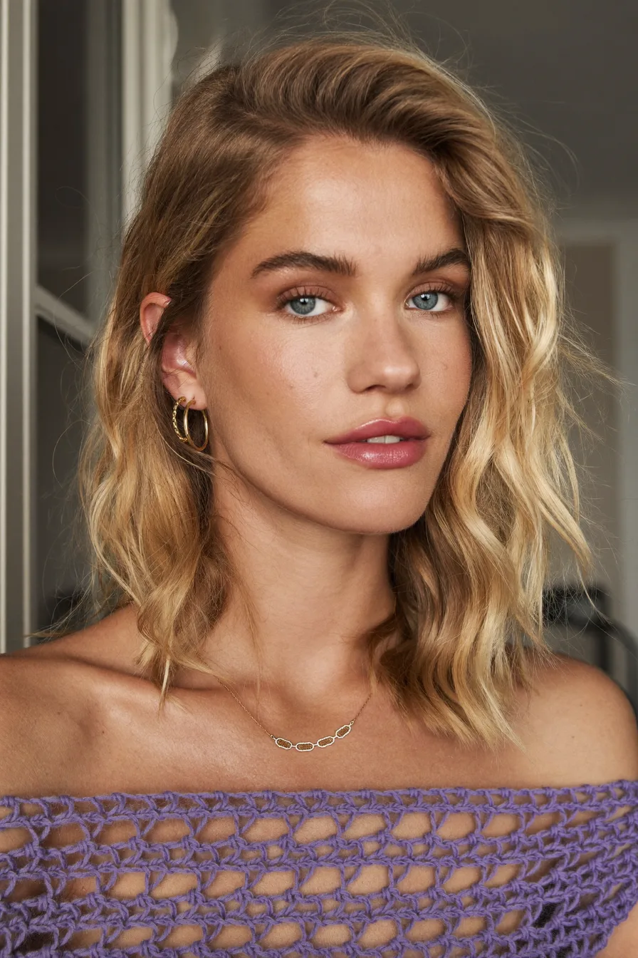 Textured Shoulder-Length Honey Blonde Hair with Long Layers