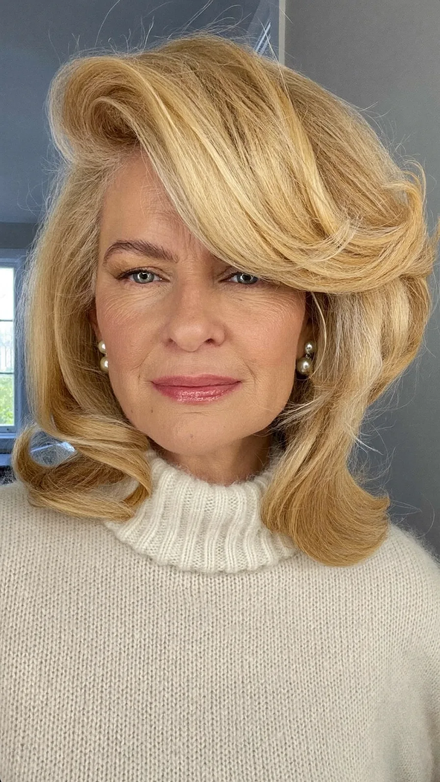 Elegant Shoulder-Length Voluminous Layered Side-Swept Hairstyle